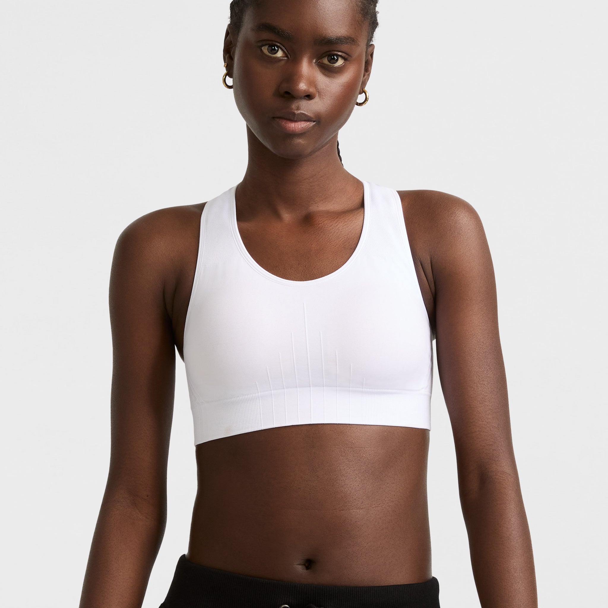 Seamless Racerback Sports Bra for Workouts & Yoga | Infinity C Logo