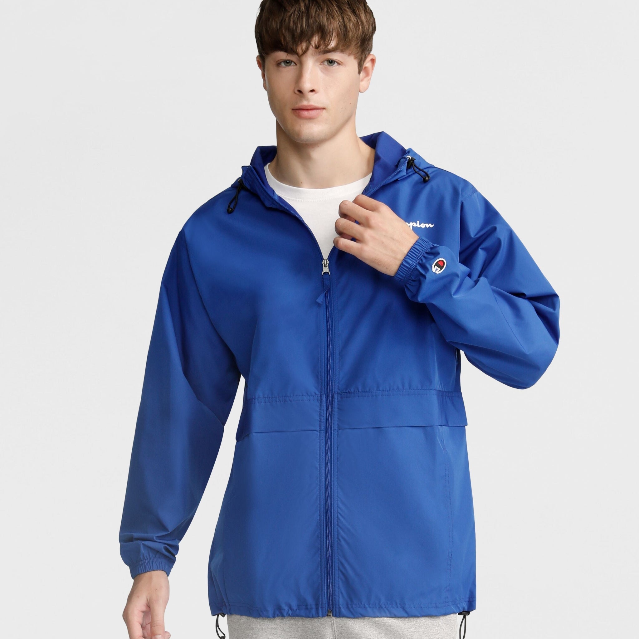 Windproof Packable Jacket with Hood for Outdoor Adventures | Stadium Script Logo